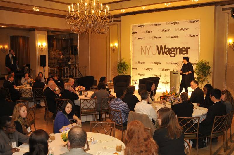 Wagner Dean Ellen Schall addressing guests at 100 Days event