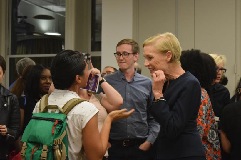 Cecile Richards talking with students during the networking reception