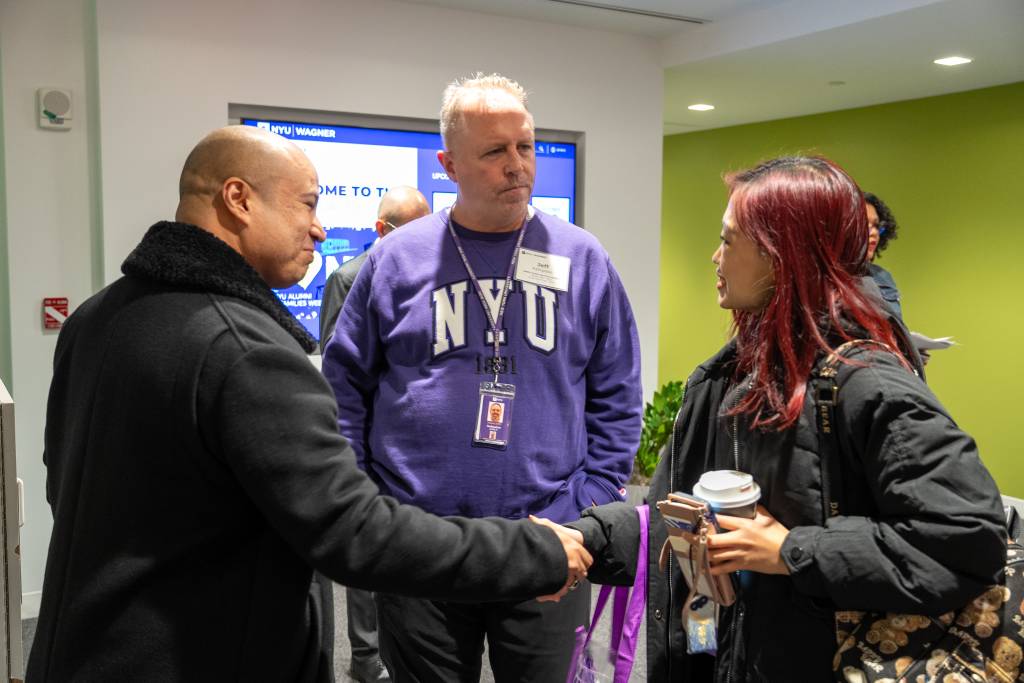 three people talking