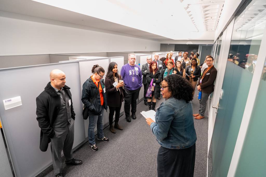 tour group in Wagner faculty offices 