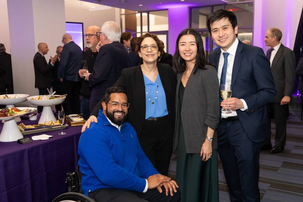 group of people posing for photo