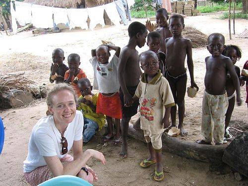 Accra, Ghana: Leanne Webster meets with children while visiting a microfinance farming community as 