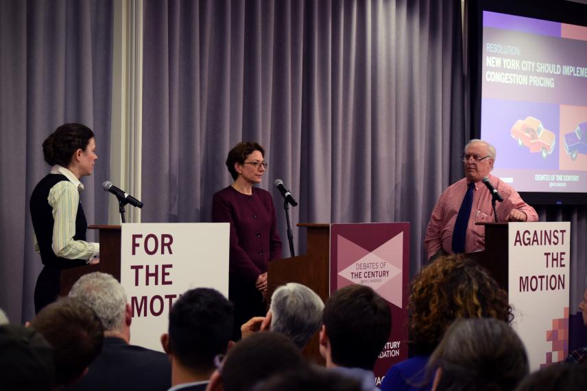 Nicole Gelinas (for the motion), moderator Polly Trottenberg, and Richard Brodsky (against the motion)