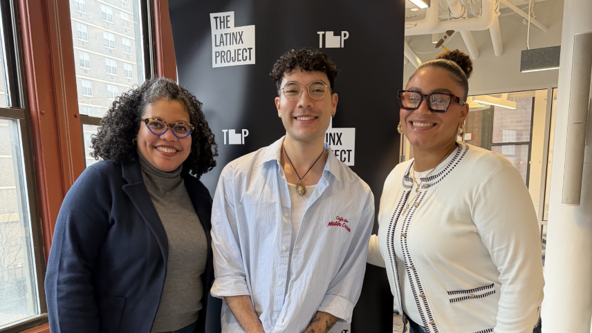 Photo of David Salinas with two women in front of a black background with The Latinx Project's logo. One of the women is Wagner professor Judy Pryor-Ramirez.