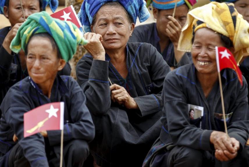 Ethnic Pa'O women sit as they wait for Burmese pro-democracy leader Aung San Suu Kyi to arrive to speak on voter education at the Hsiseng township in Shan state, Myanmar Sept. 5, 2015. Soe Zeya Tun—Reuters