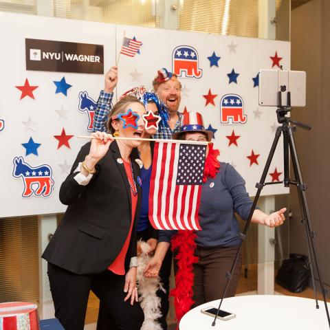 Cheeky photos at the photo booth with patriotic props