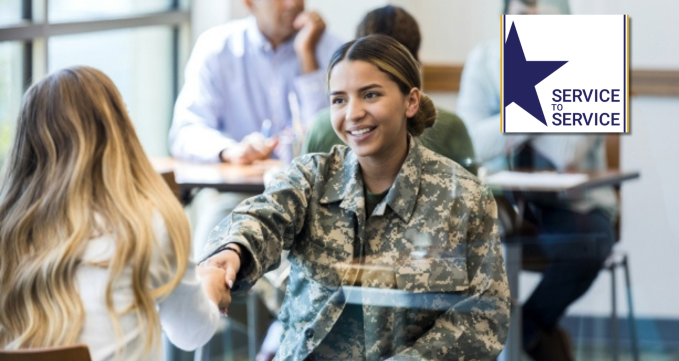 veteran shaking woman's hand