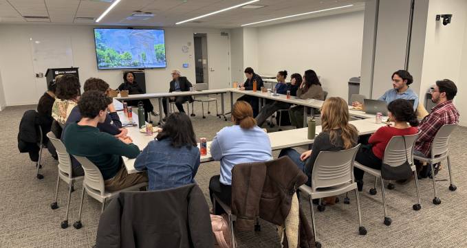 students sitting around roundtable