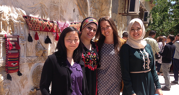 Justine Jacob with her Jordanian dialect teachers during an end of year celebration at her language center in Amman (2017).