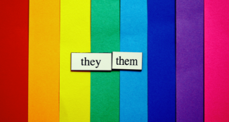 They them card over rainbow background